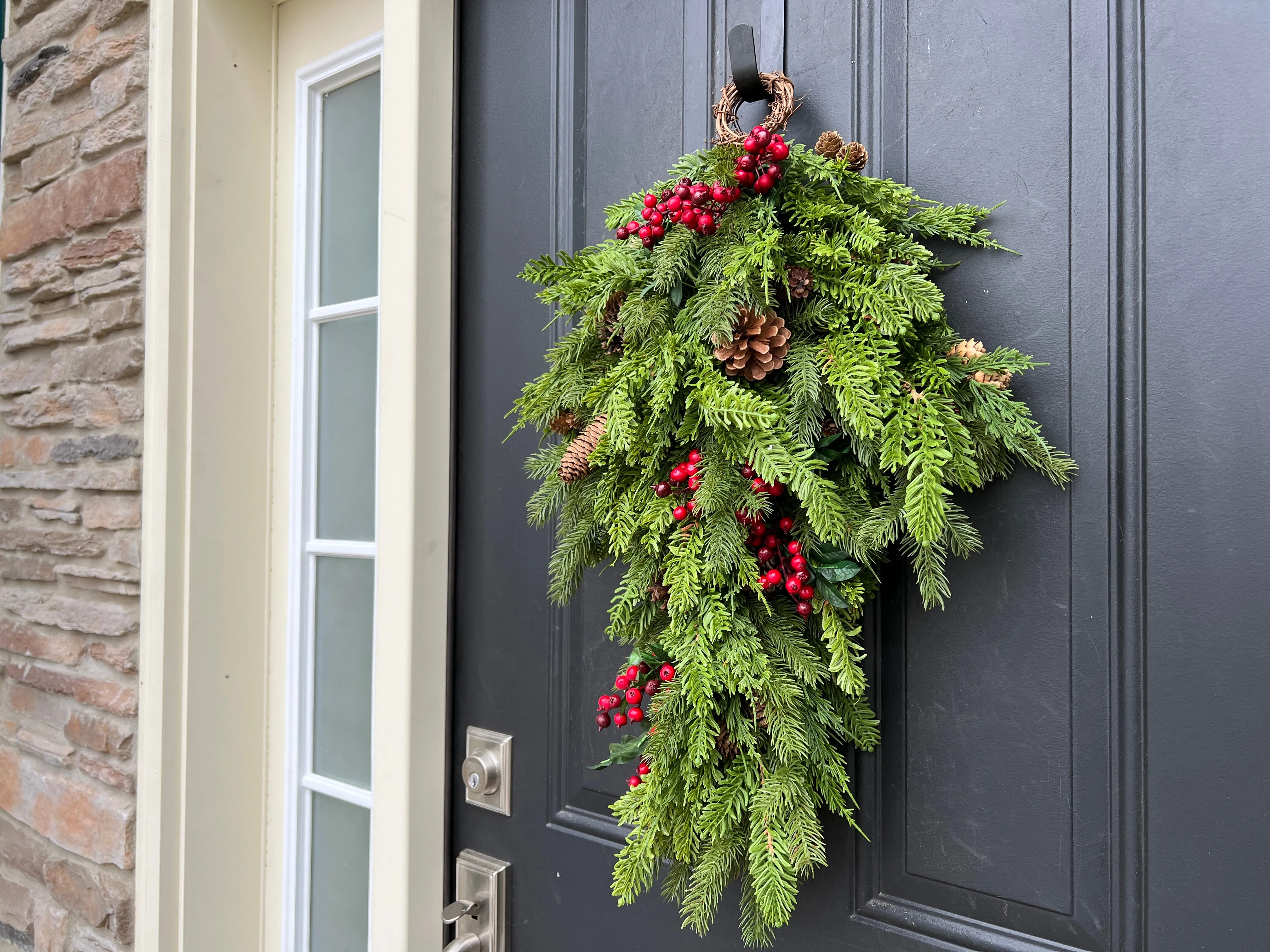 Natural Touch Pine Teardrop Wreath with Red Berries